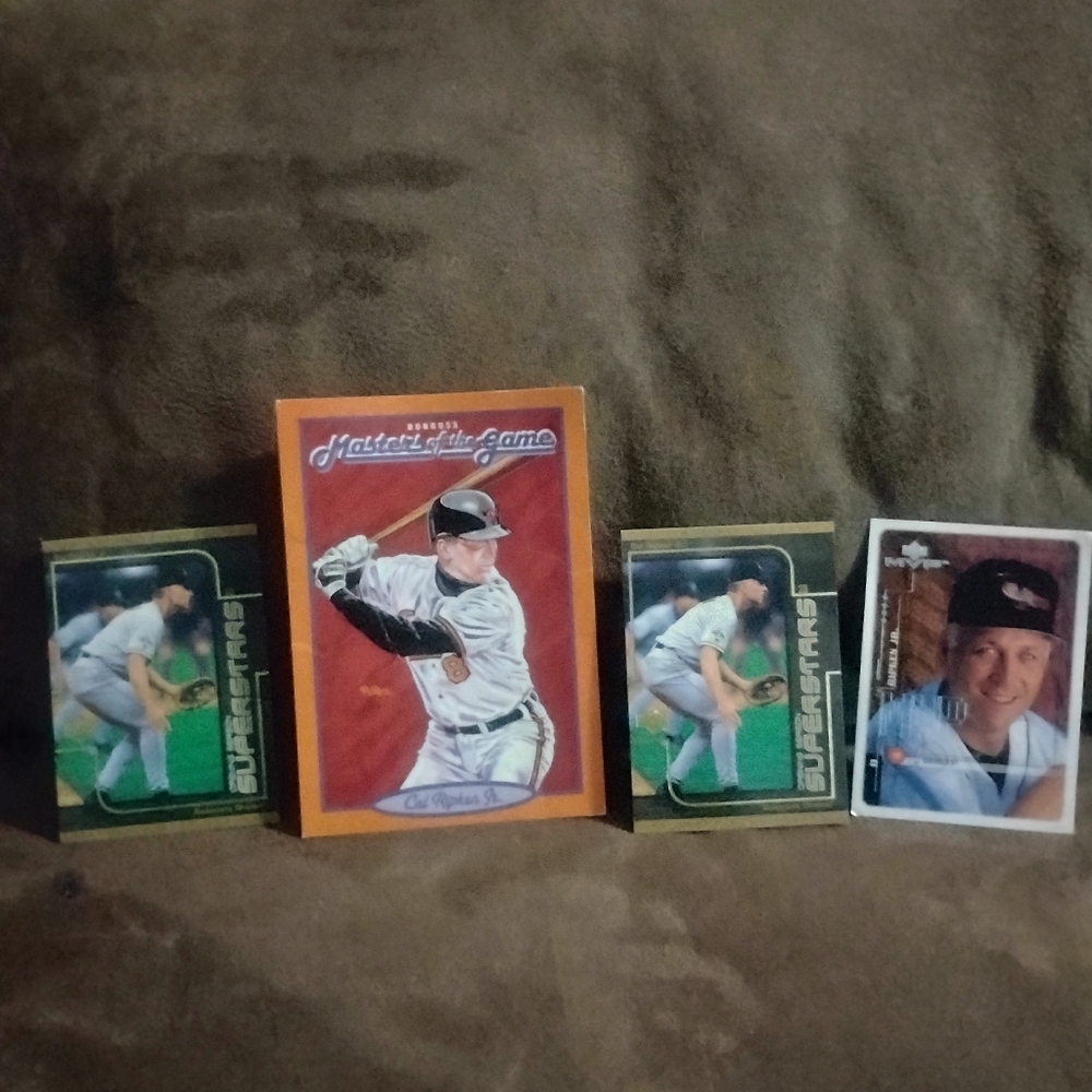 Lot of 4 Cal Ripken Jr. Baseball cards.